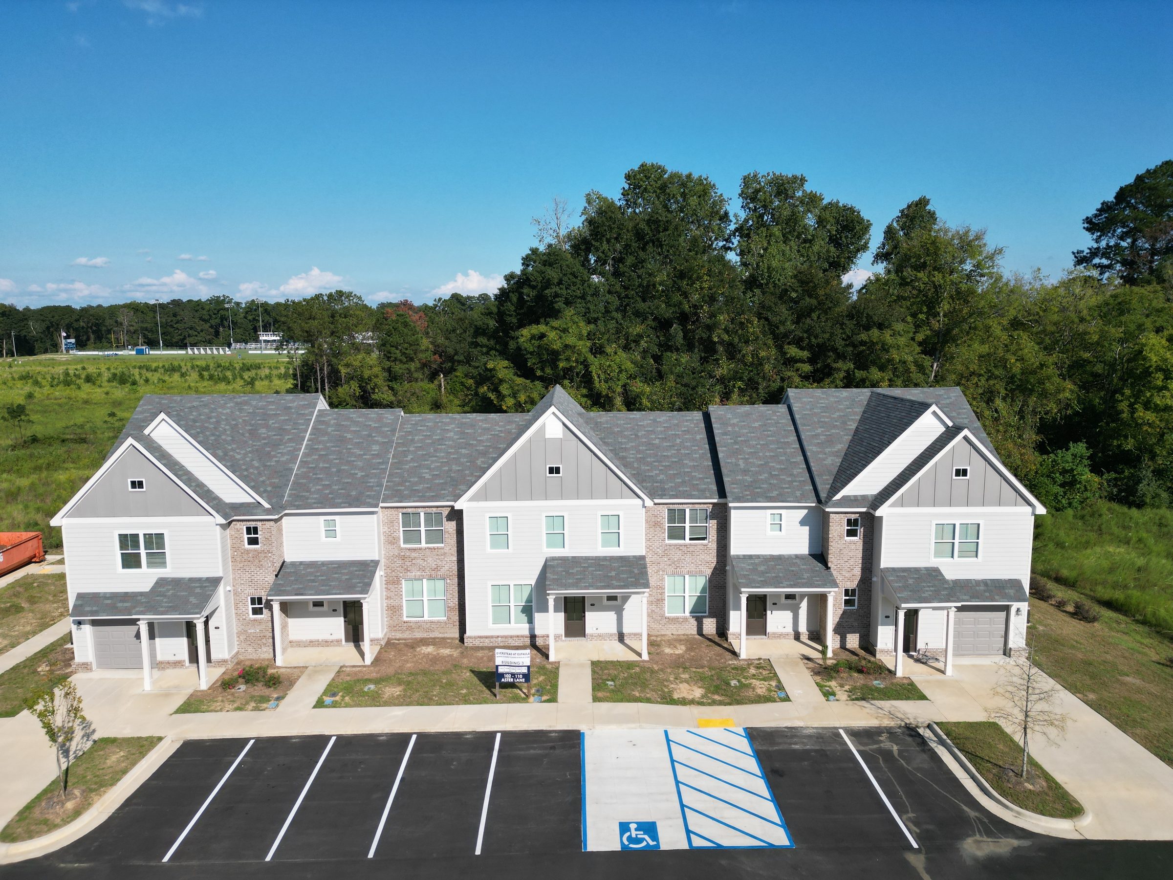 Aerial front elevation of an Everstead townhome building